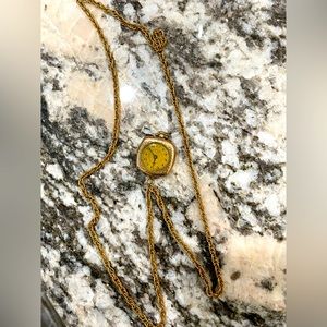 Vintage Gold Watch on a gold braided necklace